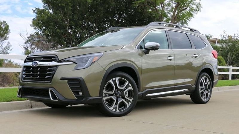 2024 Subaru Ascent parked next to a white fence