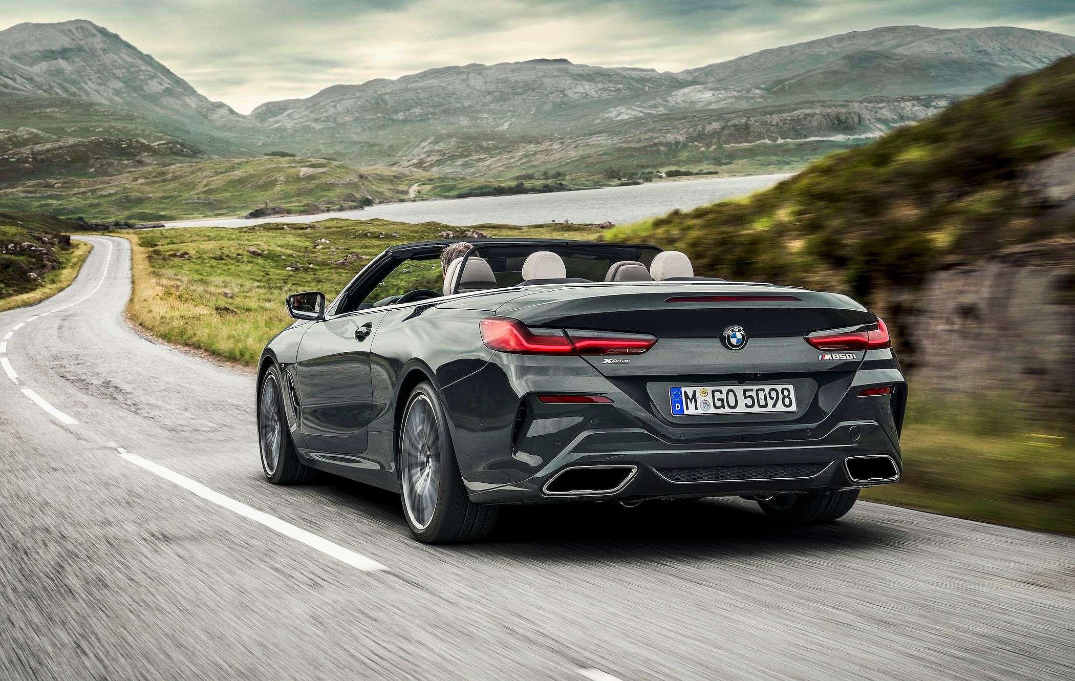 BMW 8 Series M850i Convertible driving away