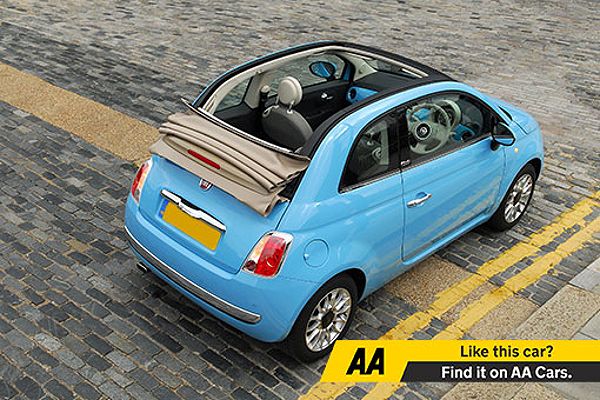 Fiat 500C parked with the roof down