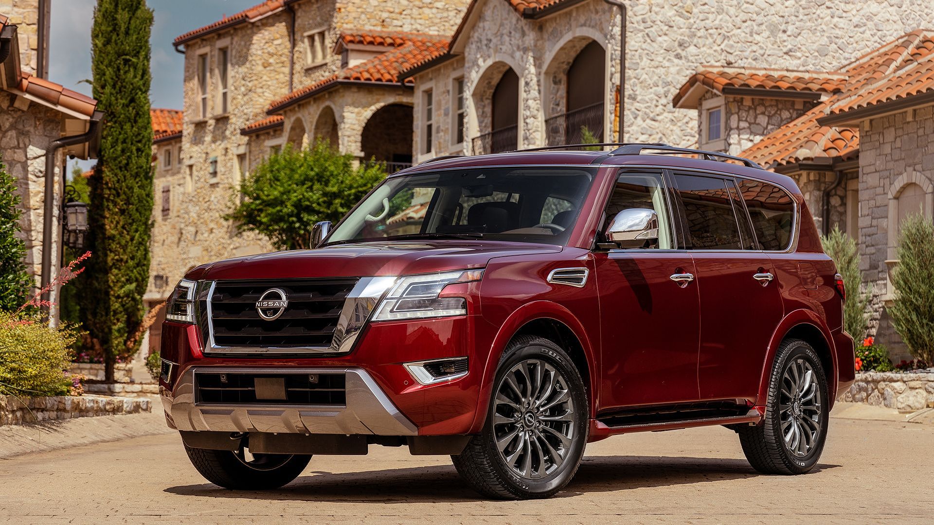 Maroon Nissan Armada parked